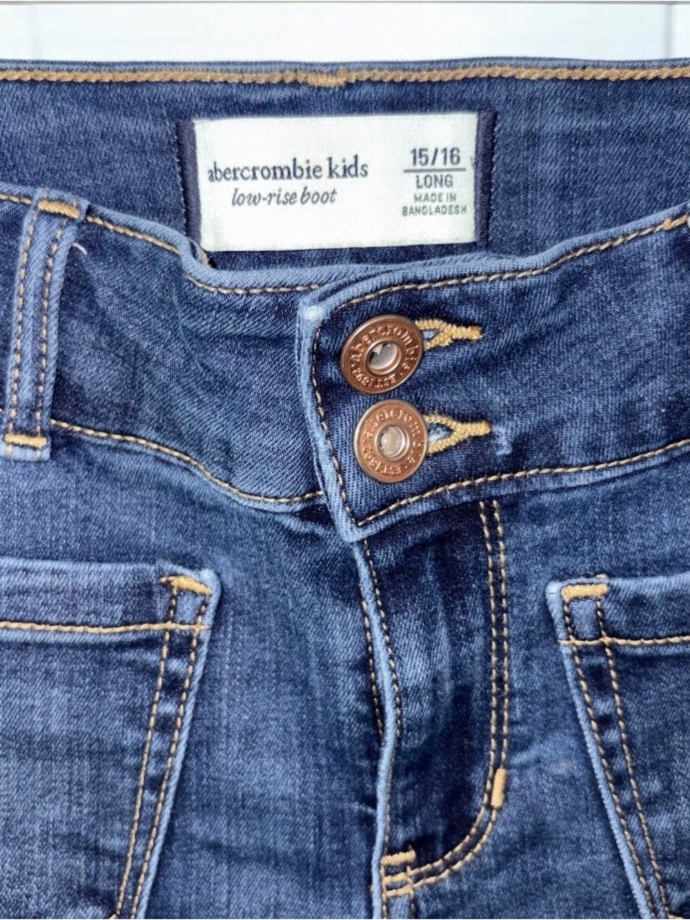 abercrombie kids dark blue low-rise boot jeans
